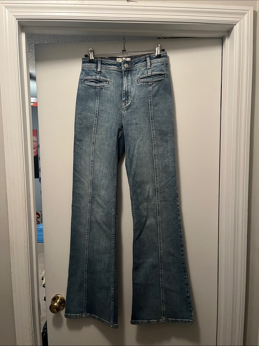 Free People high-rise flare blue jeans with Red stars on the behind size 26